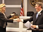 Brookhaven Judge Laura Stevenson receives the oath of office from Mayor John Ernst.