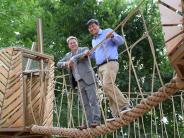 Mayor Ernst and Councilmember Park go out on a limb on the new Briarwood Park Treehouse.