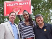 Council Members Bates Mattison and John Park with two-time WNBA Champion Lisa Leslie.