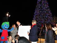 CHOA family helps light tree at Light Up Brookhaven