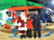 Santa with chopper at Light Up Brookhaven