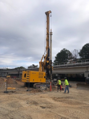 The drilling rig used to drill shoring piles