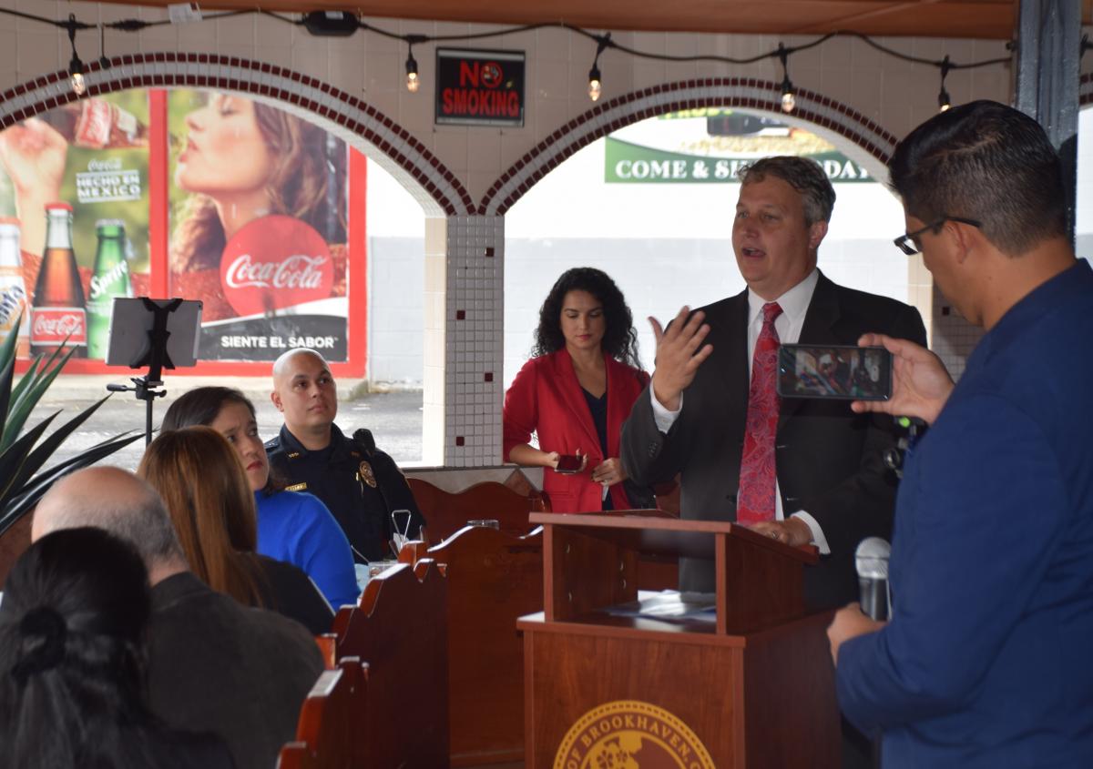 Brookhaven Mayor John Ernst addresses Latino community partners at El Potro on Buford Highway.